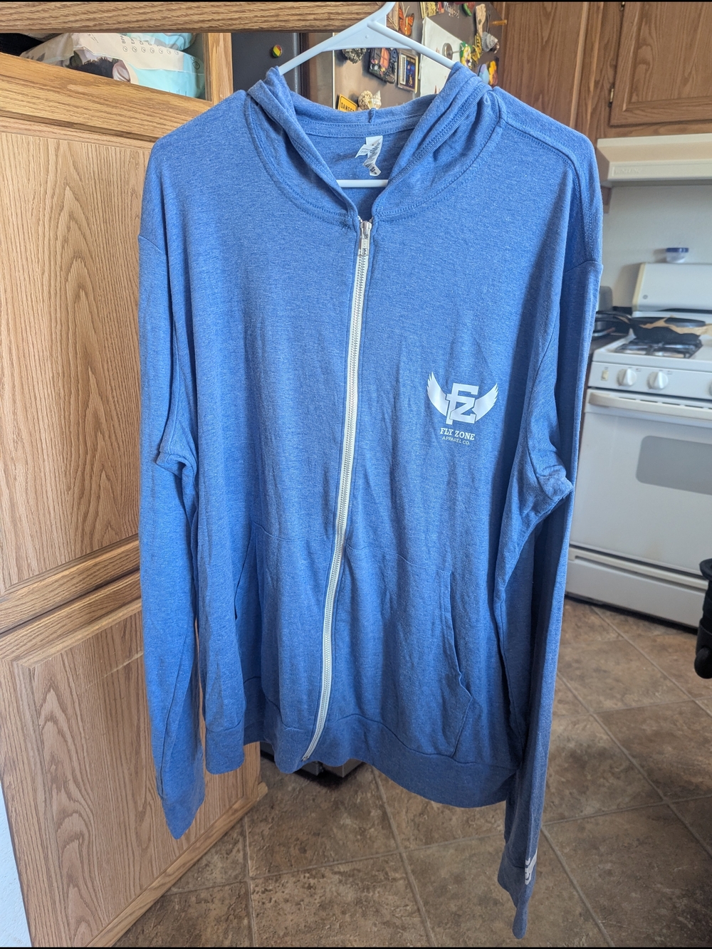 Blue Zip-Up Hoodie with Small White Logo
